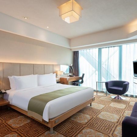 Holiday Inn Binhai Тиендзин Екстериор снимка