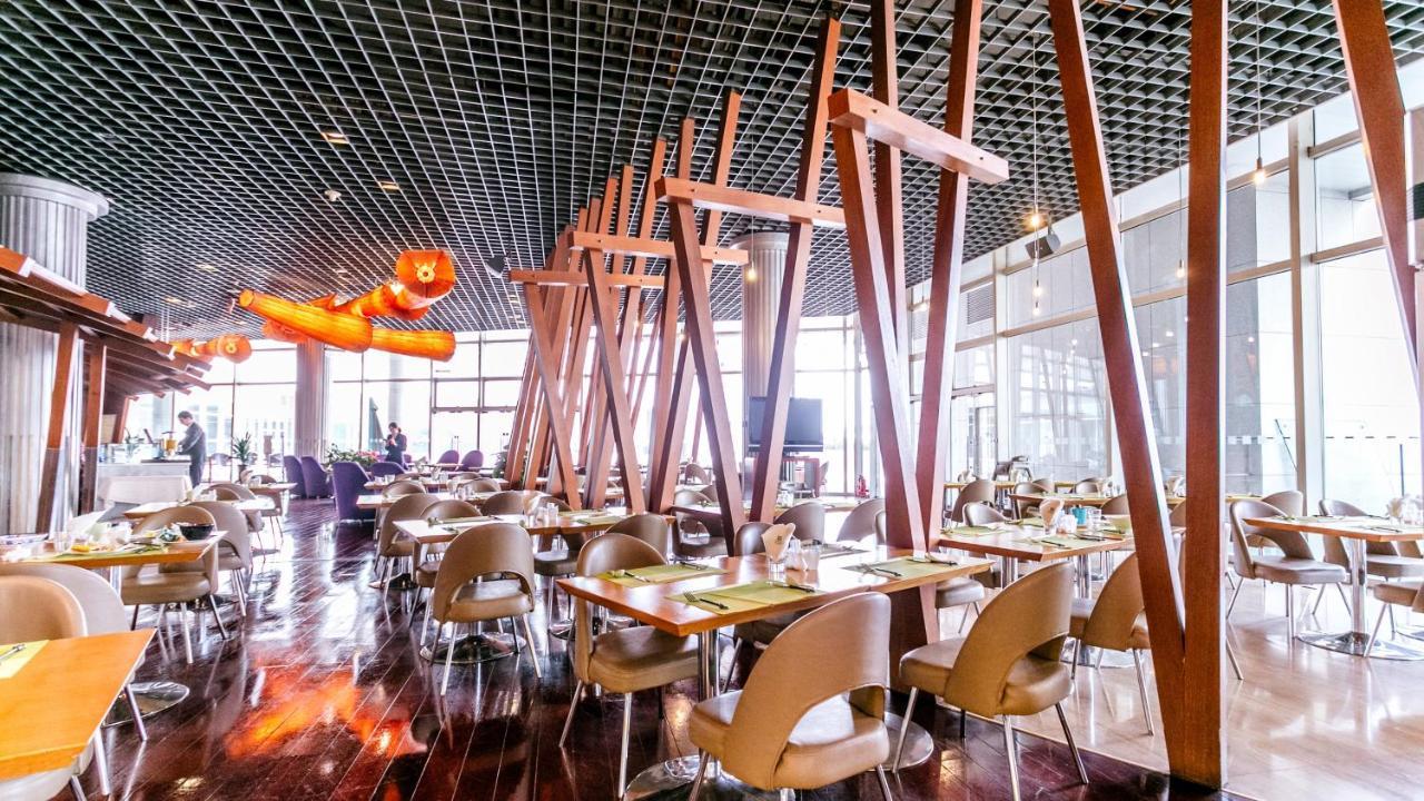 Holiday Inn Binhai Тиендзин Екстериор снимка