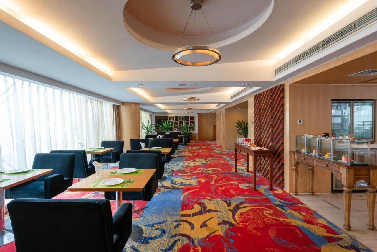 Holiday Inn Binhai Тиендзин Екстериор снимка