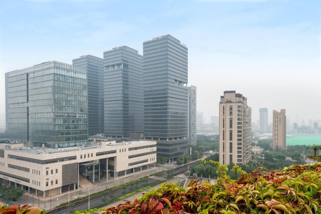 Holiday Inn Binhai Тиендзин Екстериор снимка