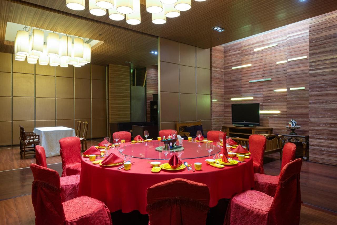 Holiday Inn Binhai Тиендзин Екстериор снимка