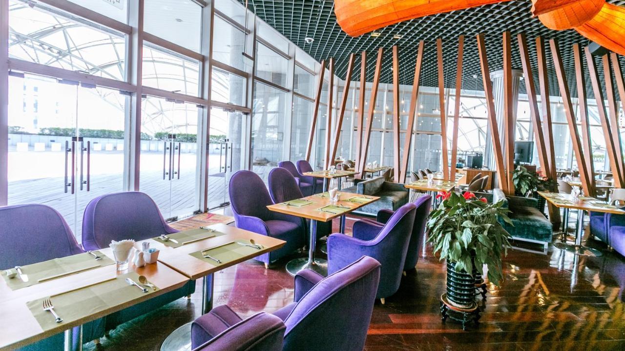 Holiday Inn Binhai Тиендзин Екстериор снимка