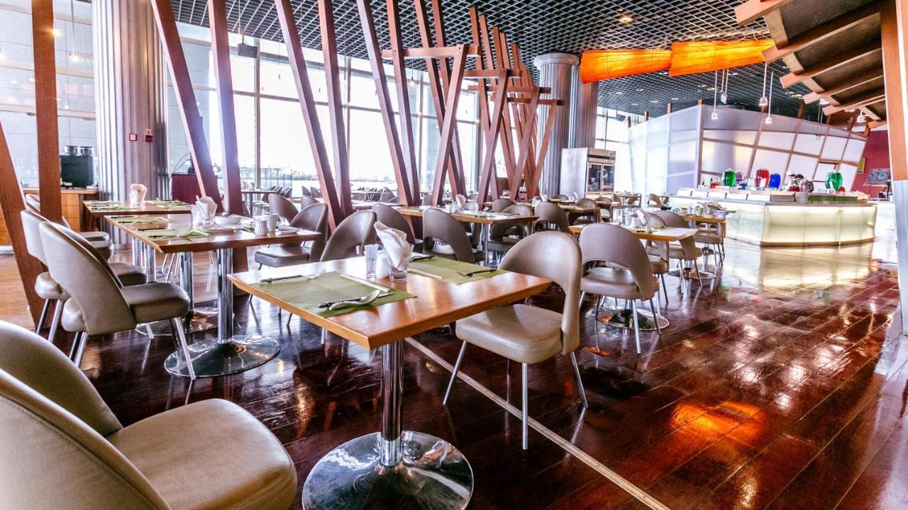 Holiday Inn Binhai Тиендзин Екстериор снимка