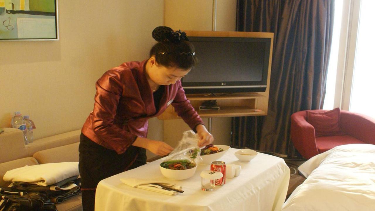 Holiday Inn Binhai Тиендзин Екстериор снимка