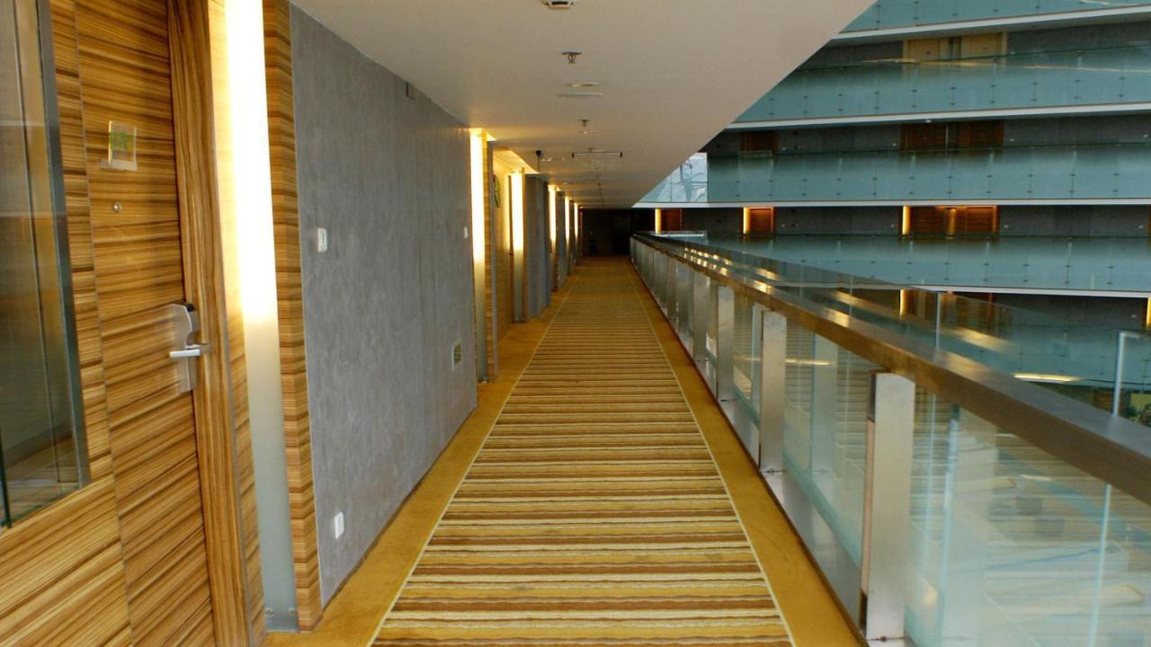 Holiday Inn Binhai Тиендзин Екстериор снимка