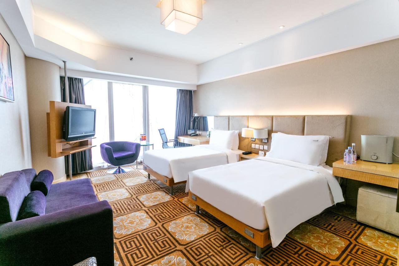 Holiday Inn Binhai Тиендзин Екстериор снимка