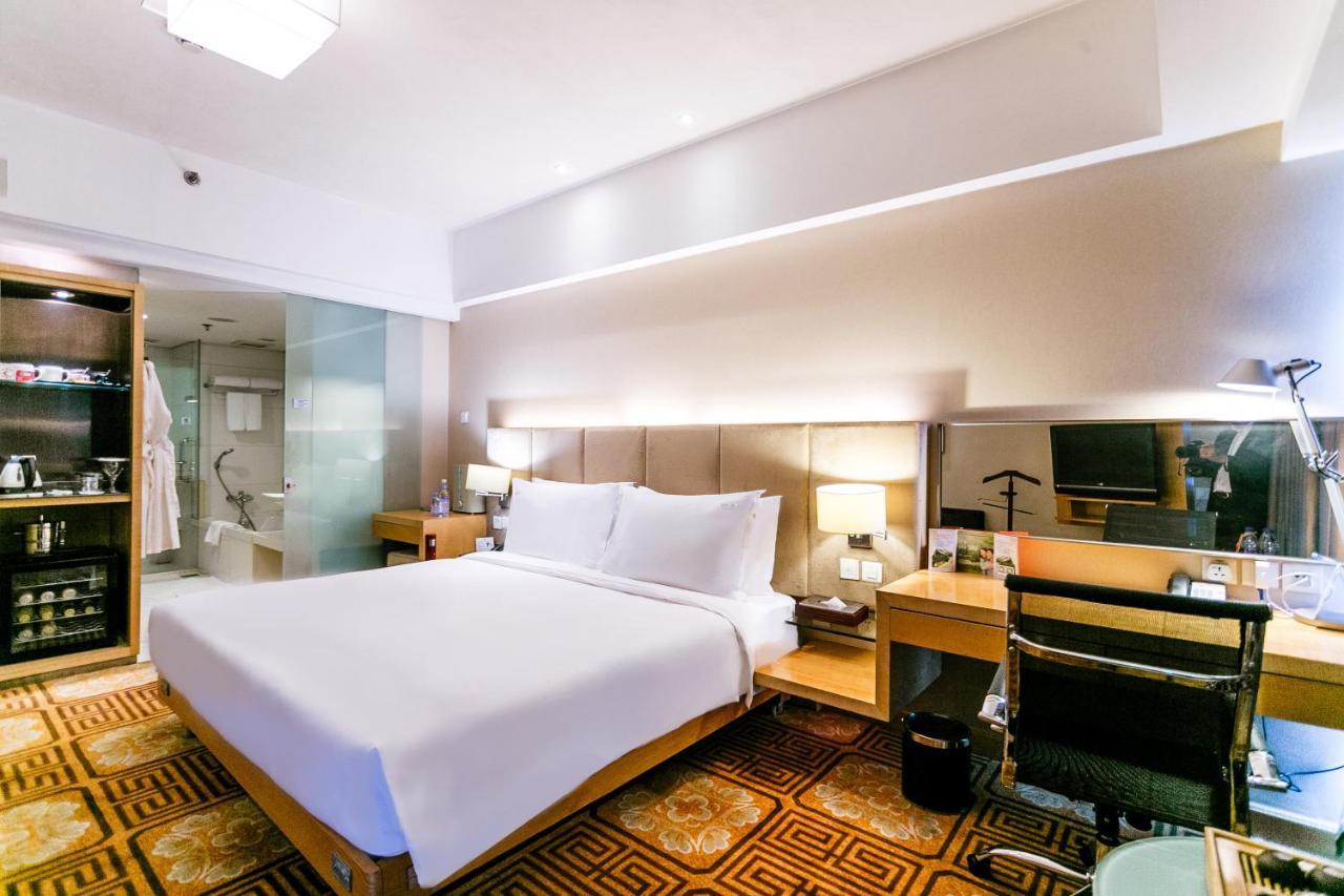 Holiday Inn Binhai Тиендзин Екстериор снимка