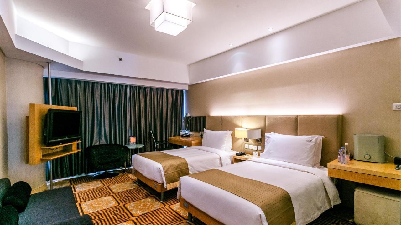 Holiday Inn Binhai Тиендзин Екстериор снимка