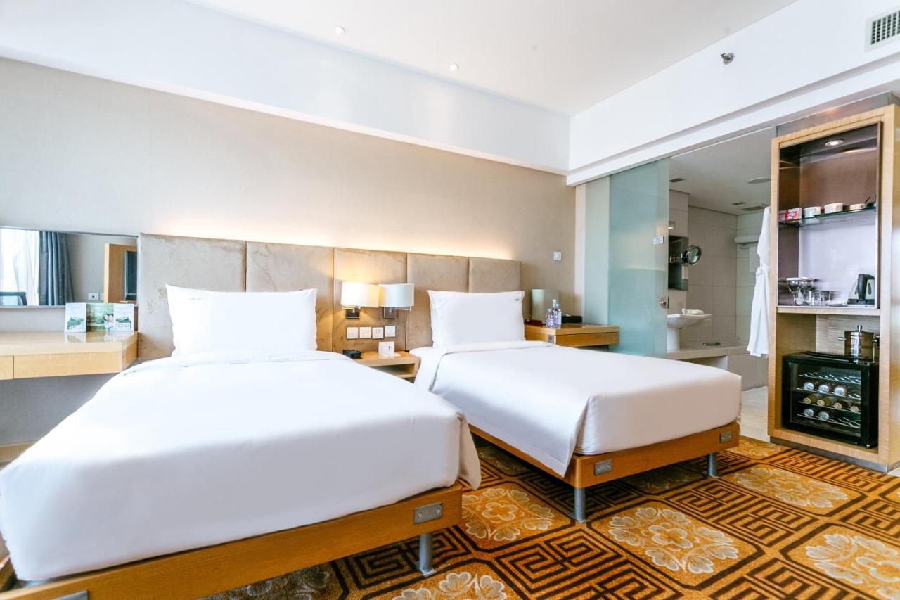 Holiday Inn Binhai Тиендзин Екстериор снимка
