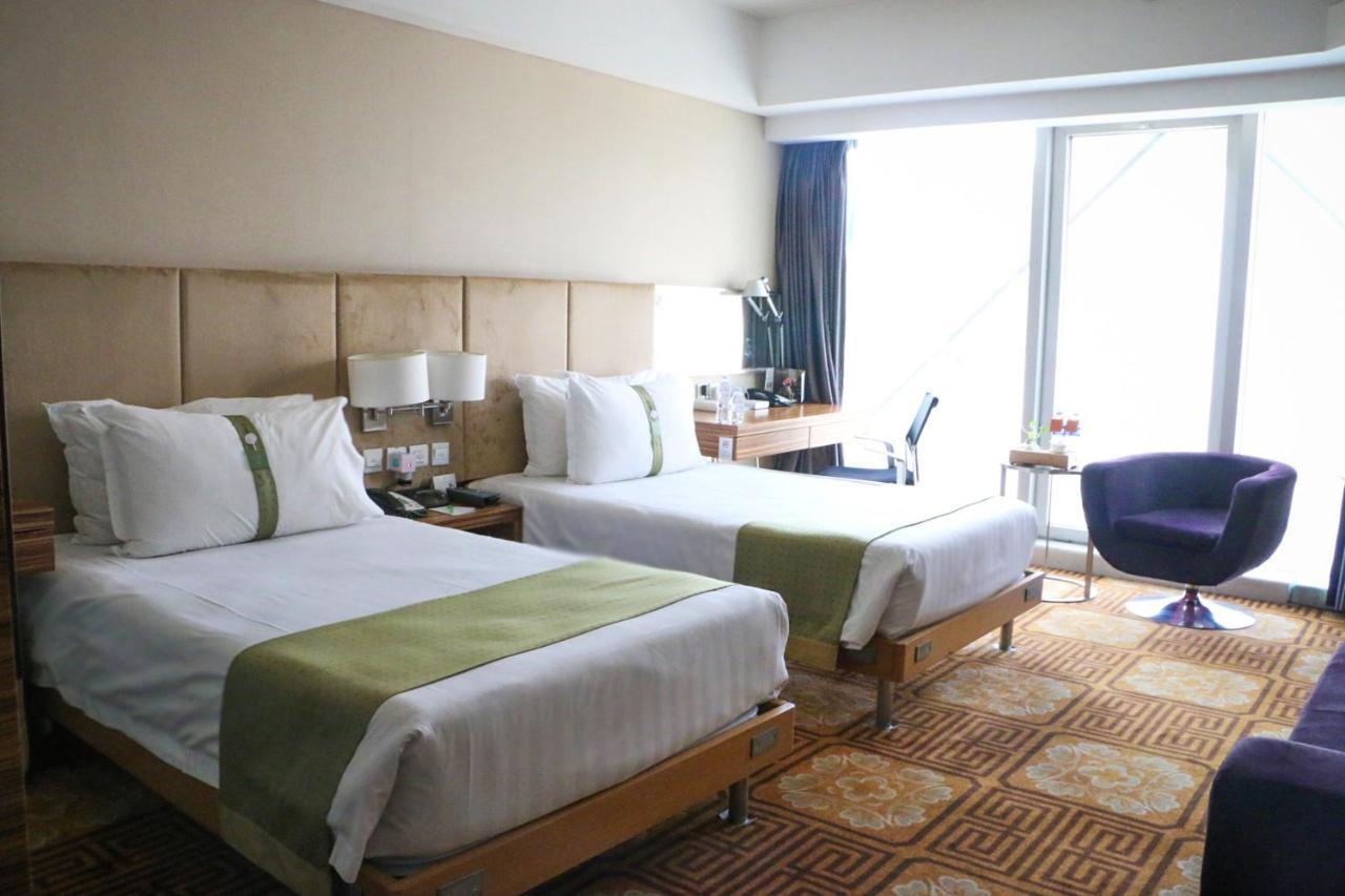 Holiday Inn Binhai Тиендзин Екстериор снимка